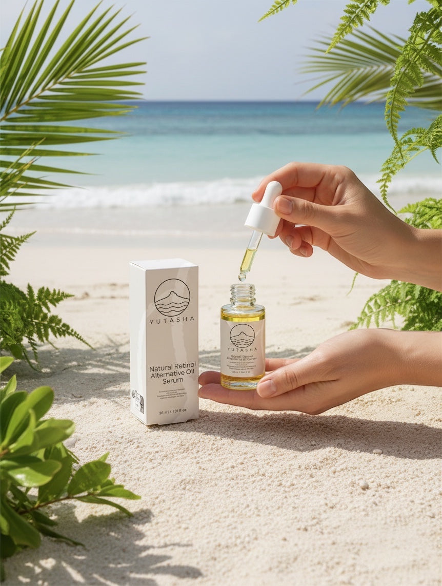 YUTASHA Bakuchi Renewal Serum bottle and box held on a tropical beach with a dropper dispensing golden botanical oil.