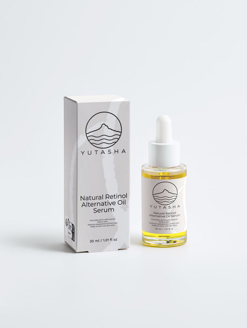 YUTASHA Bakuchi Renewal Serum bottle and white box packaging featuring minimalist branding on a light grey background.