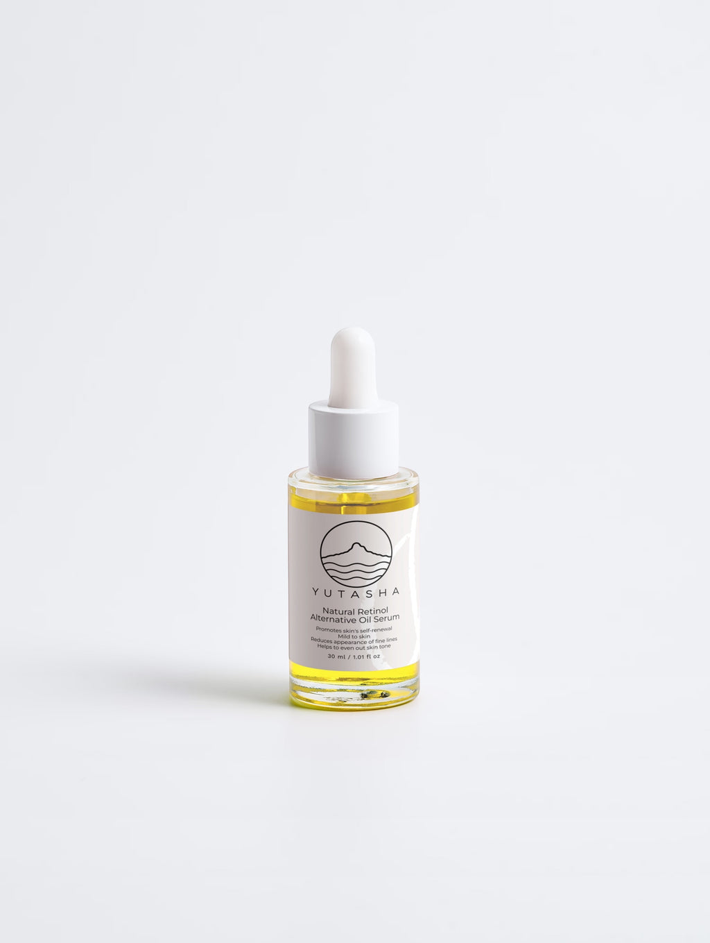 YUTASHA Bakuchi Renewal Serum in a clear glass dropper bottle with golden botanical oil against a white background