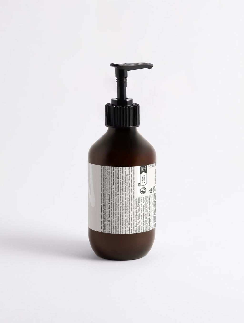 YUTASHA Kinuhada Hand Cream in a brown glass pump bottle with a minimalist label on a clean white background.