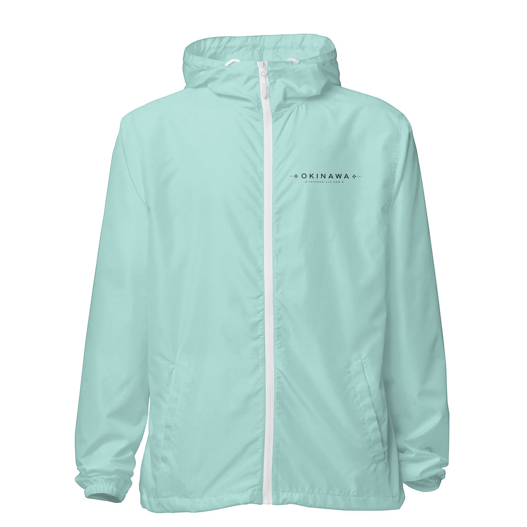 YUTASHA Toshie light mint green unisex windbreaker with a white zipper, hood, and Okinawa chest logo.