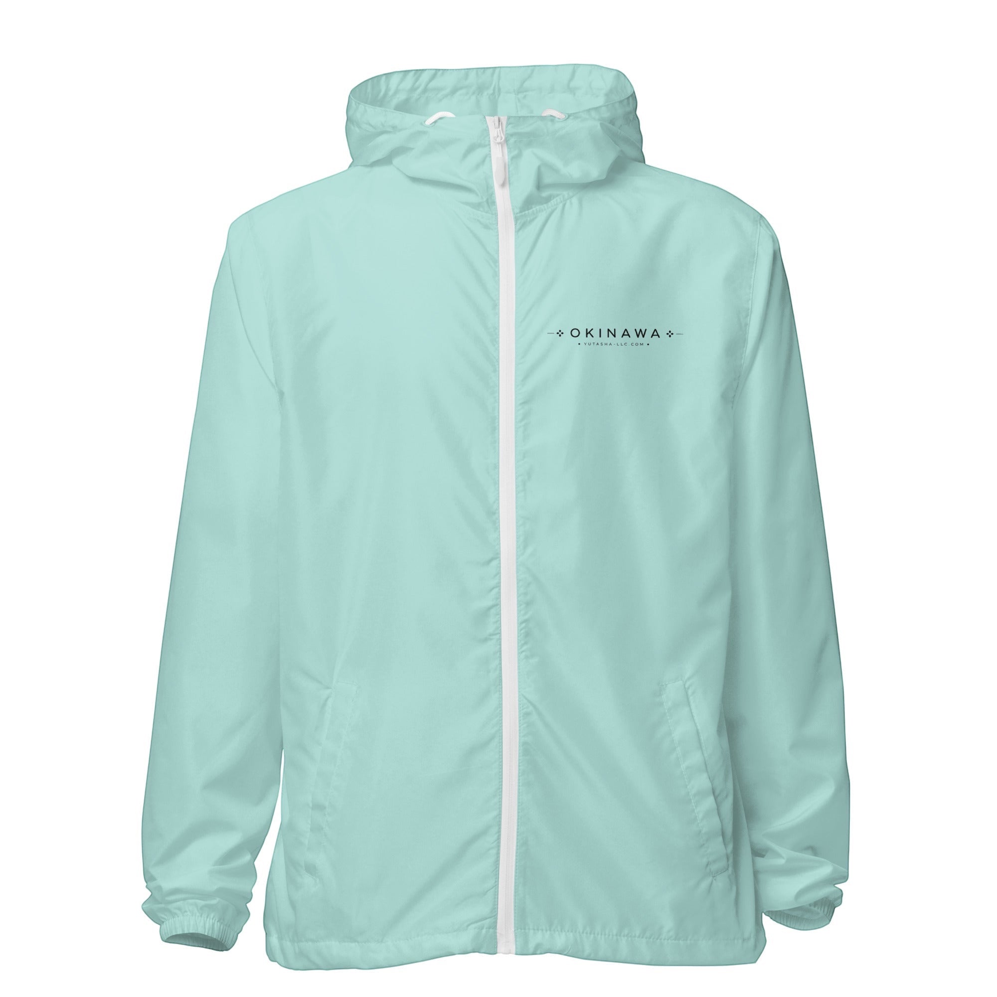 YUTASHA Toshie light mint green unisex windbreaker with a white zipper, hood, and Okinawa chest logo.