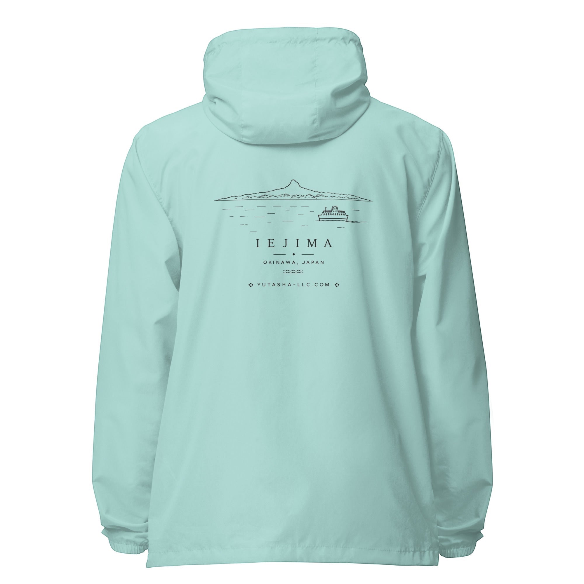 Back view of YUTASHA Toshie light blue windbreaker with Iejima island graphic print, hood, and elastic cuffs.